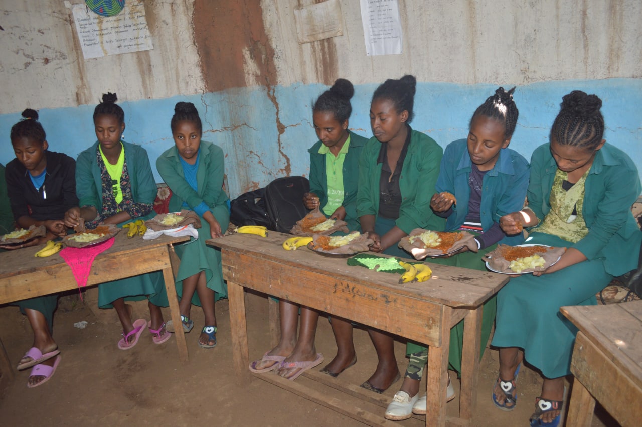 a group of students eating